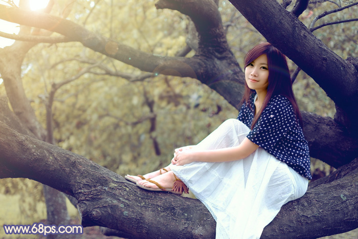 Photoshop给大树上的美女加上秋季晨曦效果 全福编程网